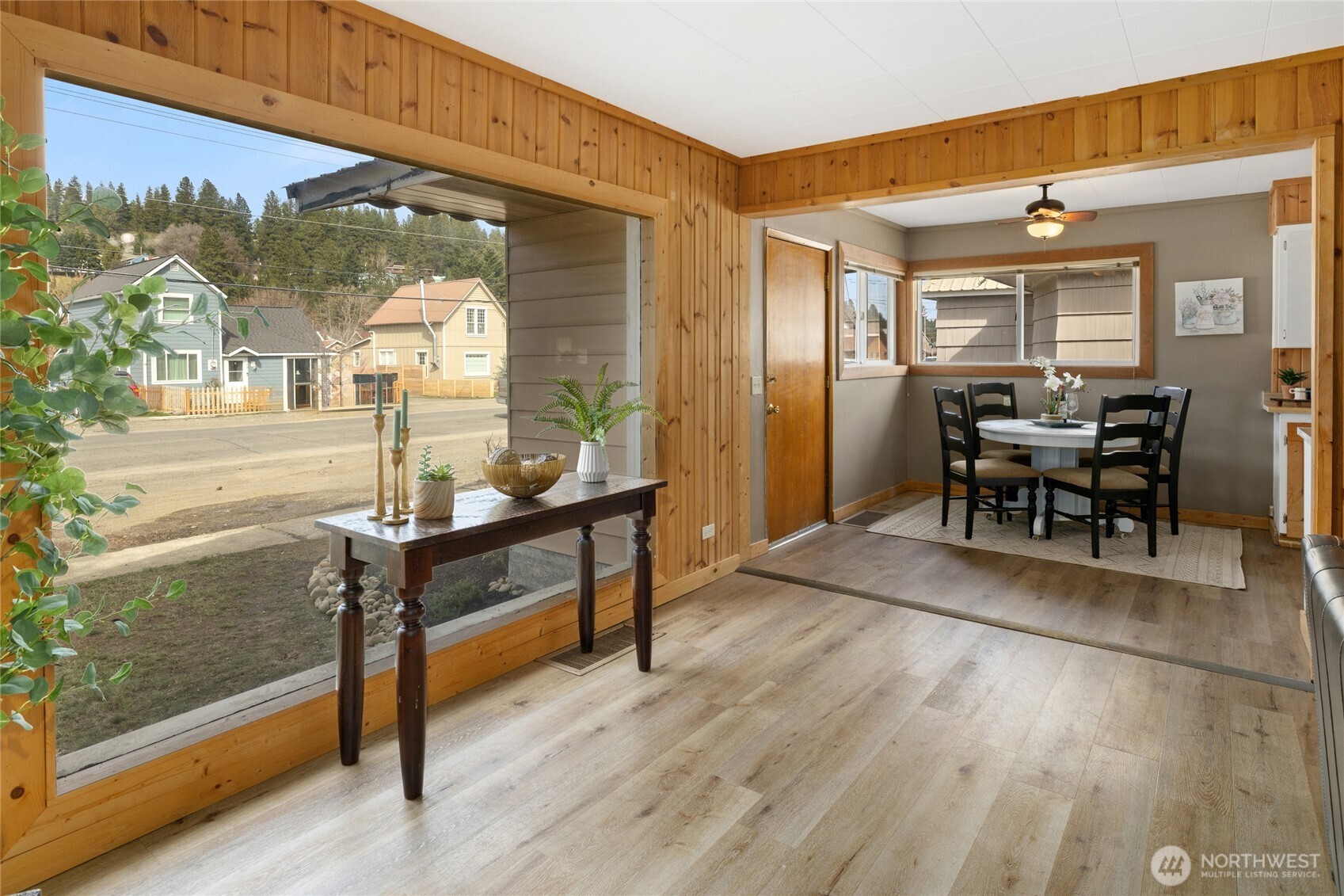 107 West 2nd Street Cle Elum, WA 98922 - Photo 8 of 39 a view of a patio with table and chairs with wooden floor and fence