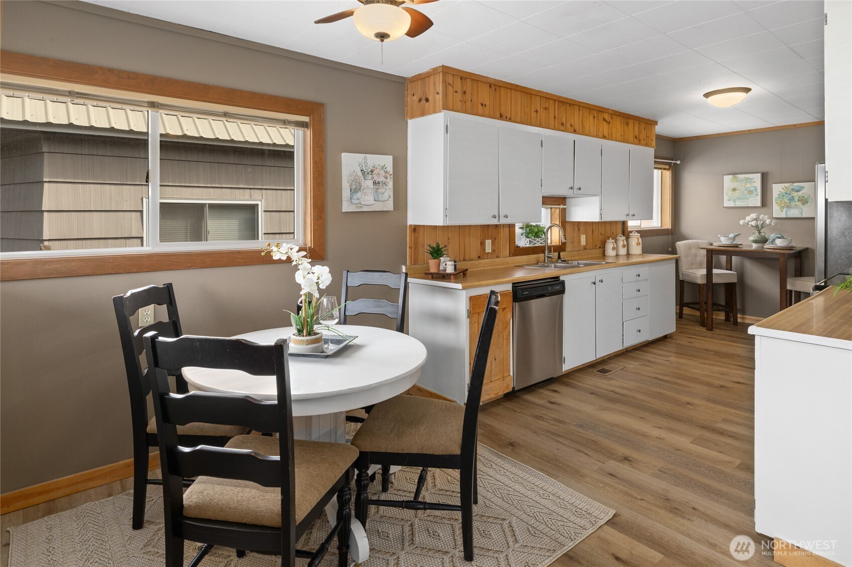 107 West 2nd Street Cle Elum, WA 98922 - Photo 9 of 39 a view of a dining room with furniture and wooden floor