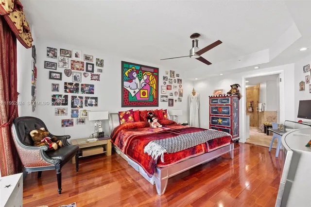 a bedroom with a bed and furniture