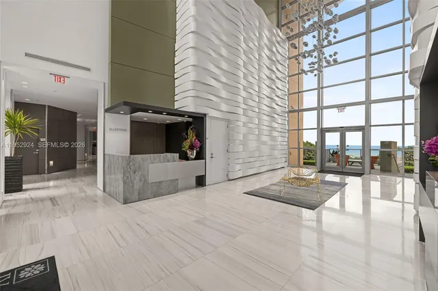 a large white room with a large window