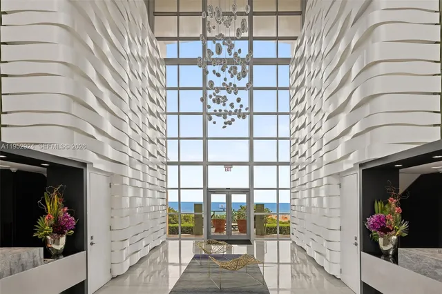 a view of entryway with flower pots