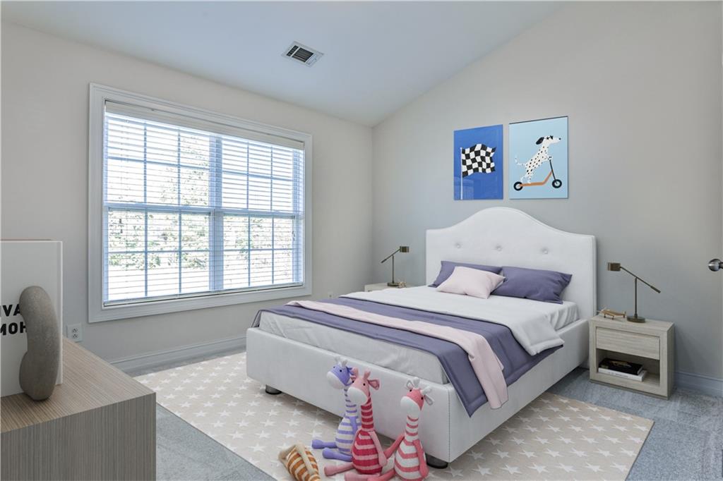 7 Reese Way Avondale Estates, GA 30002 - Photo 21 of 28 a bedroom with a bed and a window
