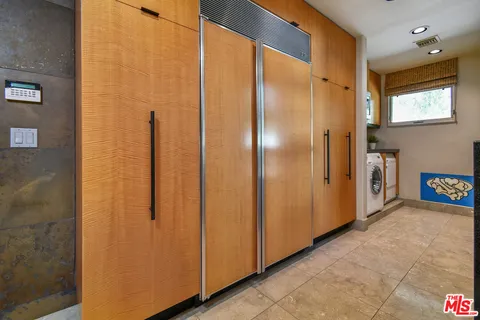 a view of a swimming pool with a yard