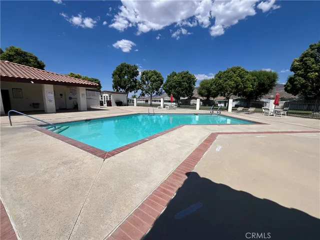 a view of a house with a swimming pool