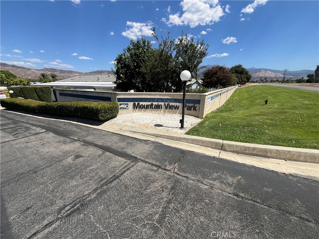 24600 Mountain Avenue, Unit 119 Hemet, CA 92544 - Photo 16 of 16 a view of a garden with an outdoor space