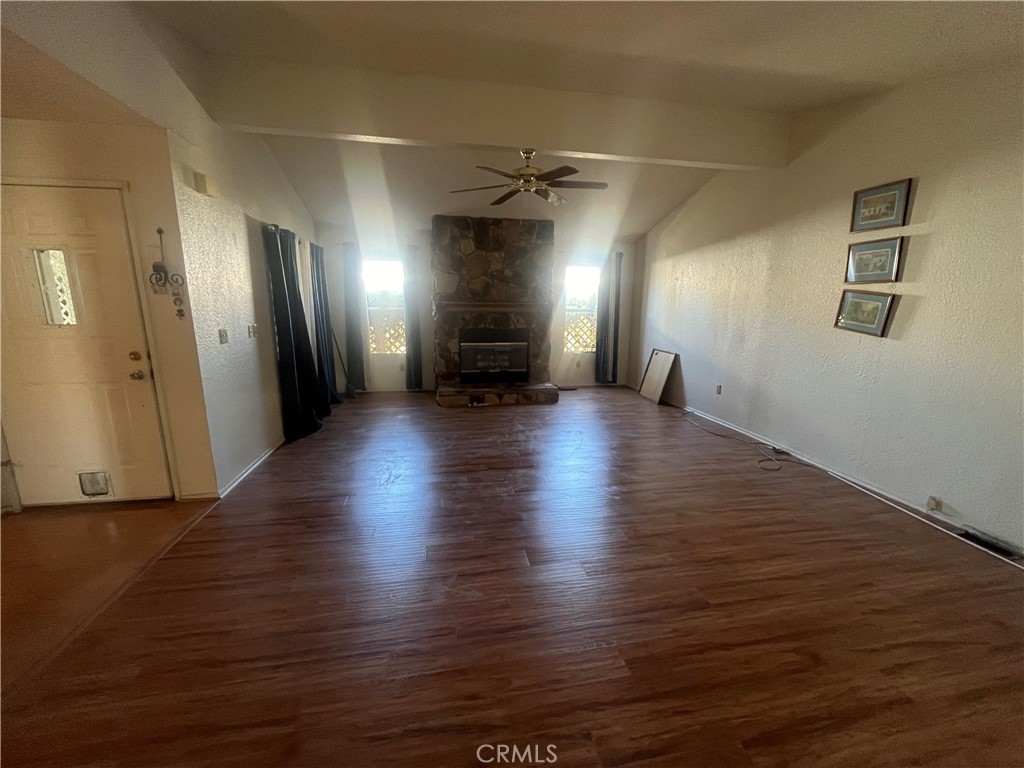 24600 Mountain Avenue, Unit 119 Hemet, CA 92544 - Photo 2 of 16 a view of a hallway with wooden floor