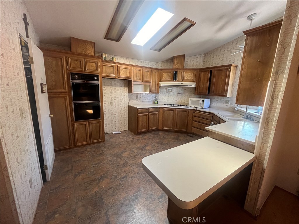 24600 Mountain Avenue, Unit 119 Hemet, CA 92544 - Photo 3 of 16 a room with storage and utility