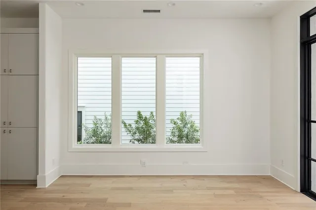 a view of a room that has a window in it