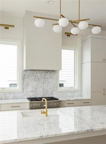 a view of a building with a window and palm tree