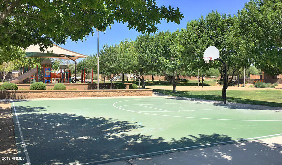 16528 West Sherman Street Goodyear, AZ 85338 - Photo 32 of 33 a view of a playground with basketball court
