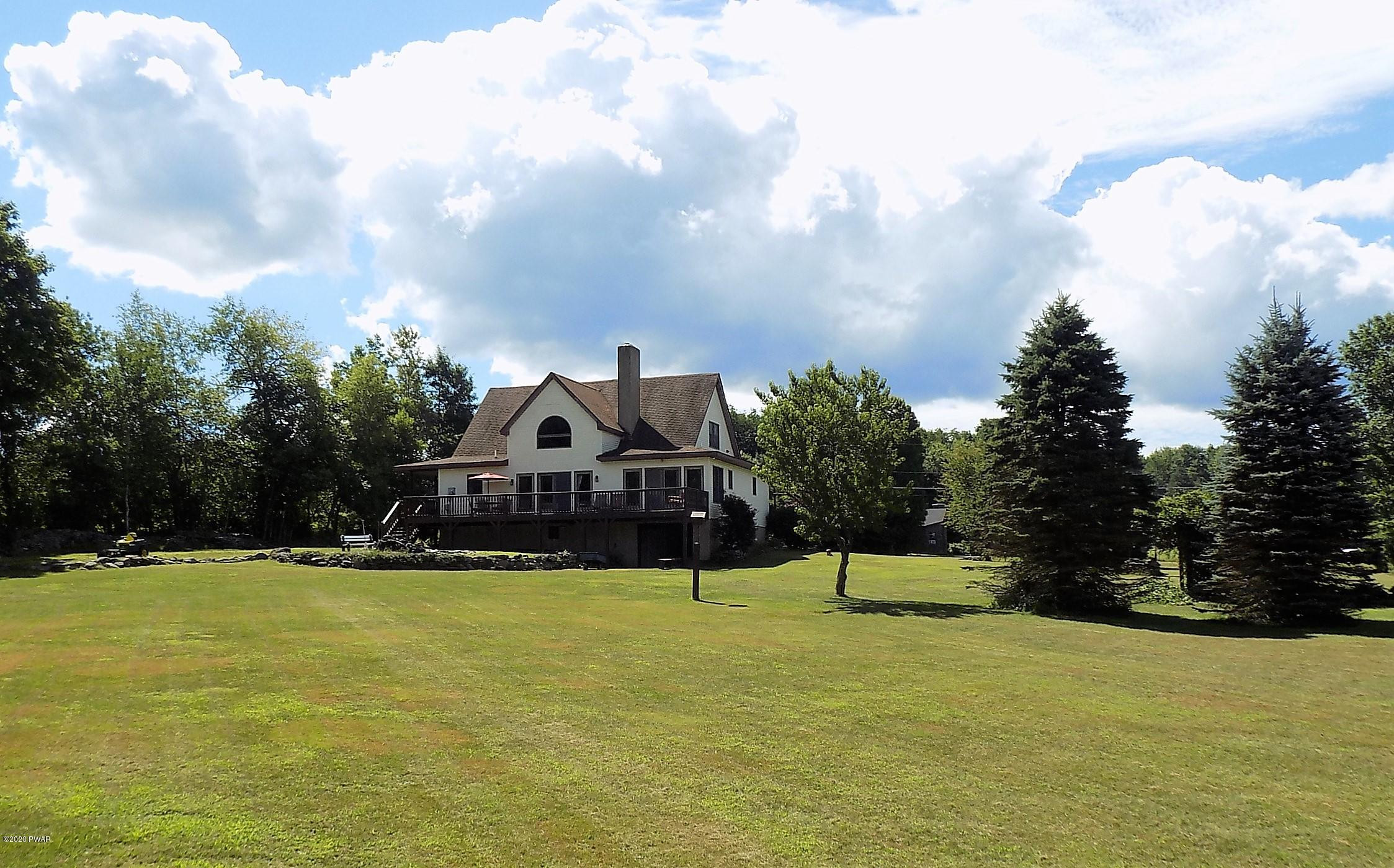 171 Valleyview Road Greentown, PA 18426 - Photo 8 of 111 a front view of a house with a yard