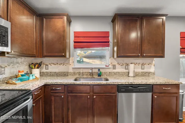 a workspace with furniture and a window