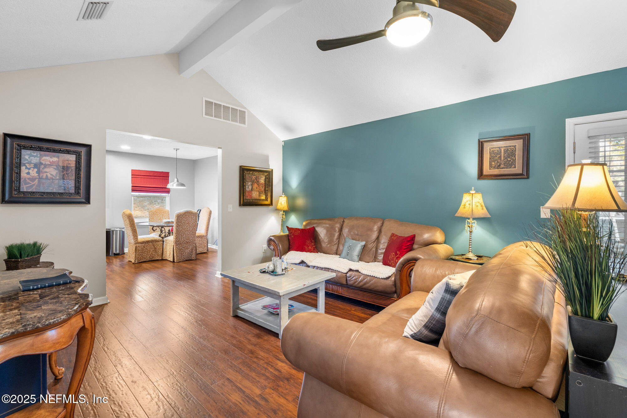 3301 Hermitage Road East Jacksonville, FL 32277 - Photo 22 of 49 a living room with furniture and a wooden floor