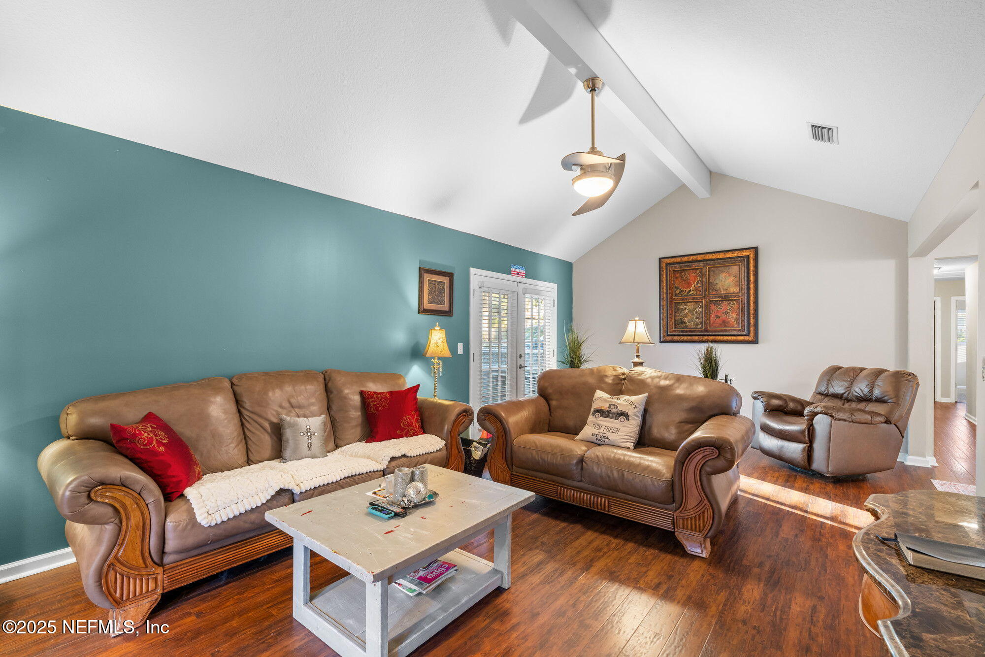 3301 Hermitage Road East Jacksonville, FL 32277 - Photo 23 of 49 a living room with furniture and wooden floor