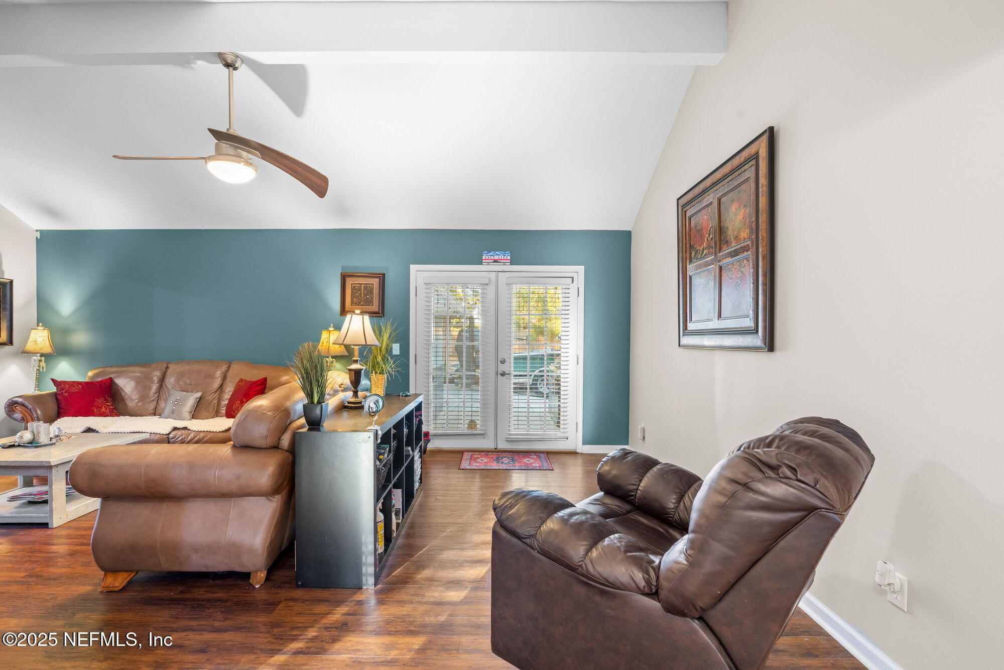 3301 Hermitage Road East Jacksonville, FL 32277 - Photo 25 of 49 a living room with furniture and wooden floor