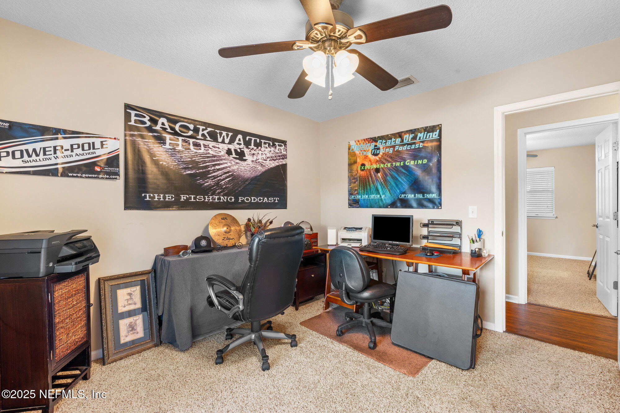 3301 Hermitage Road East Jacksonville, FL 32277 - Photo 27 of 49 a view of a workspace with furniture and a window