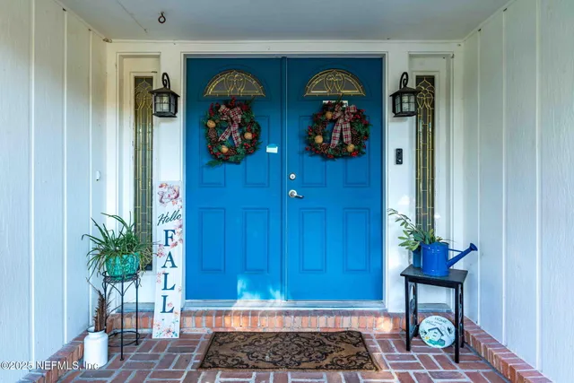 a kitchen with granite countertop stainless steel appliances and sink