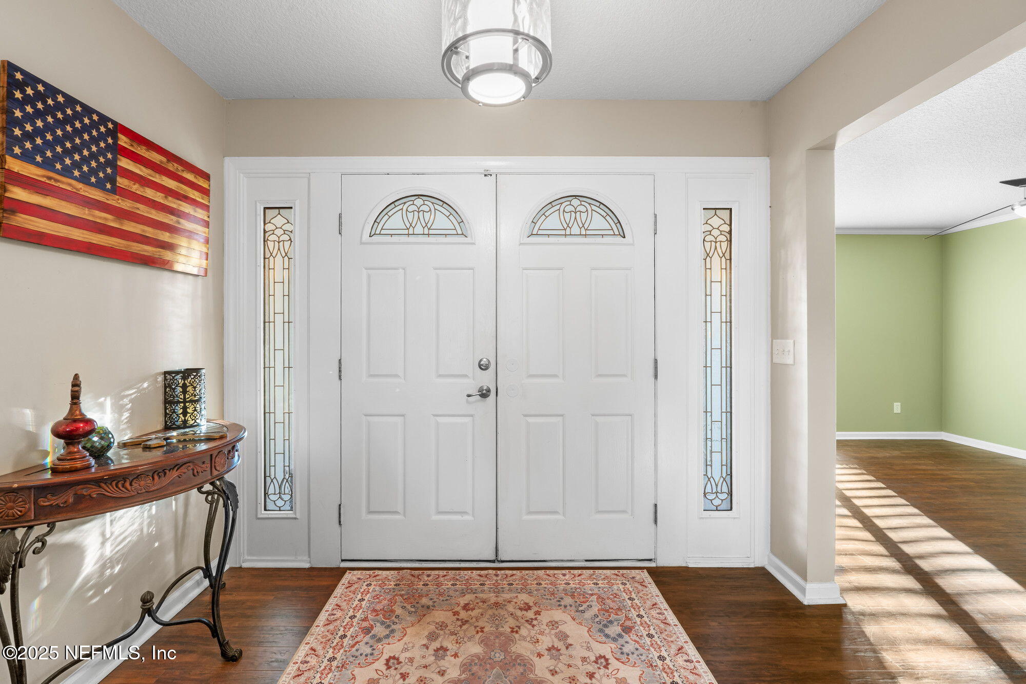 3301 Hermitage Road East Jacksonville, FL 32277 - Photo 10 of 49 a view of an entryway with wooden floor