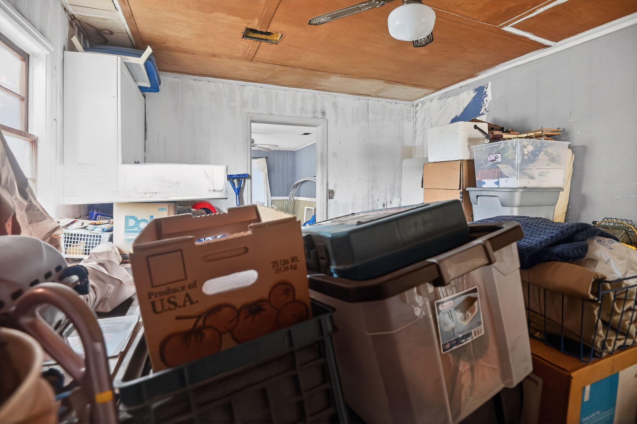 950 B Street Crestview, FL 32536 - Photo 22 of 32 a close up of a storage and utility room with racks on the wall