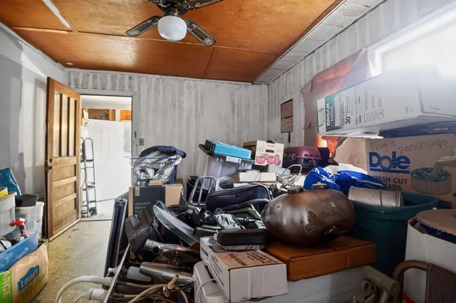 a bedroom with furniture and a window