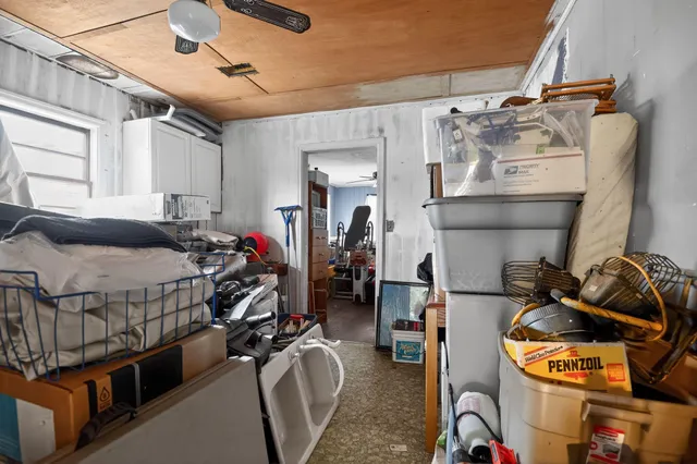 a bedroom with bed and a window