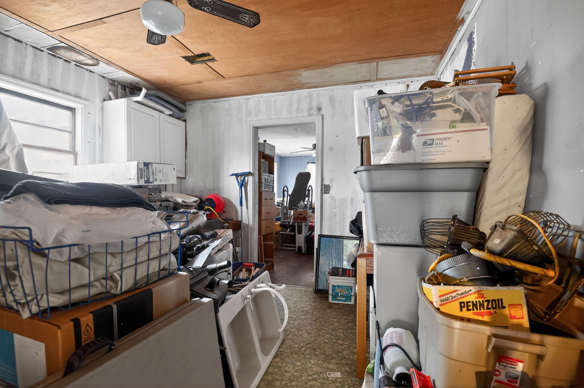 950 B Street Crestview, FL 32536 - Photo 27 of 32 a bedroom with furniture and a window
