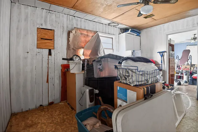 a view of front door with wooden floor