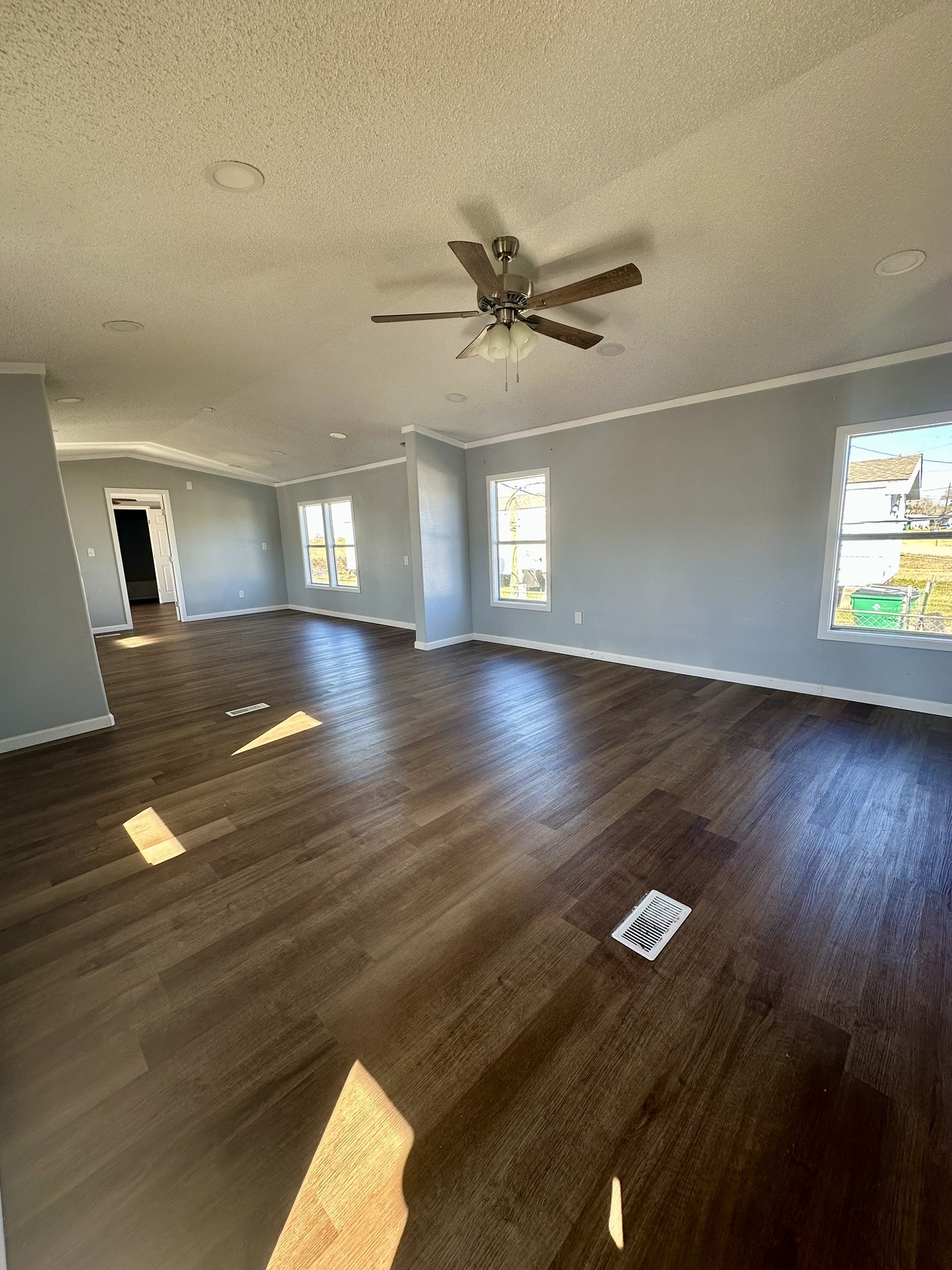 2529 Mcdonald Road Oyster Creek, TX 77541 - Photo 4 of 14 wooden floor in an empty room with a window