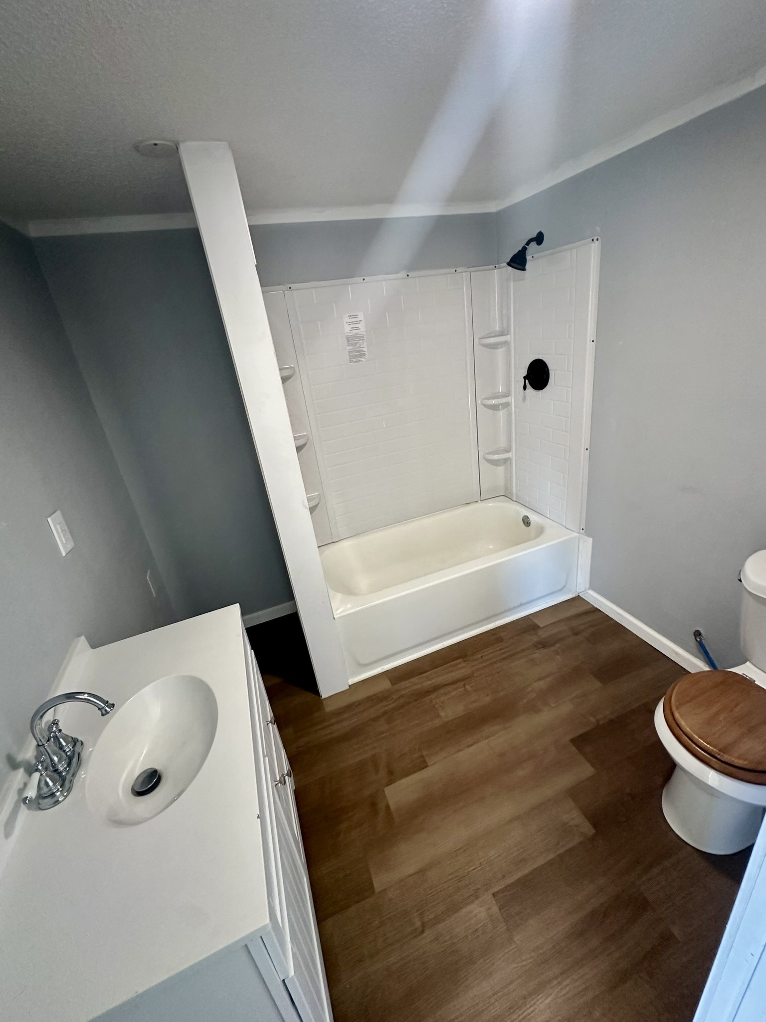 2529 Mcdonald Road Oyster Creek, TX 77541 - Photo 10 of 14 a bathroom with a sink and a toilet