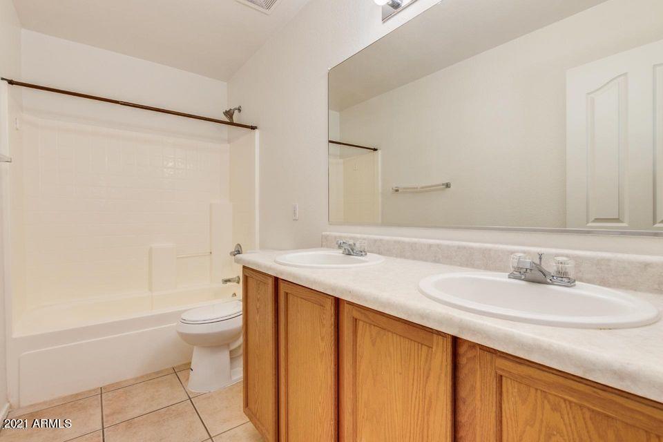 9369 West Eaton Road Phoenix, AZ 85037 - Photo 14 of 24 Guest Bathroom