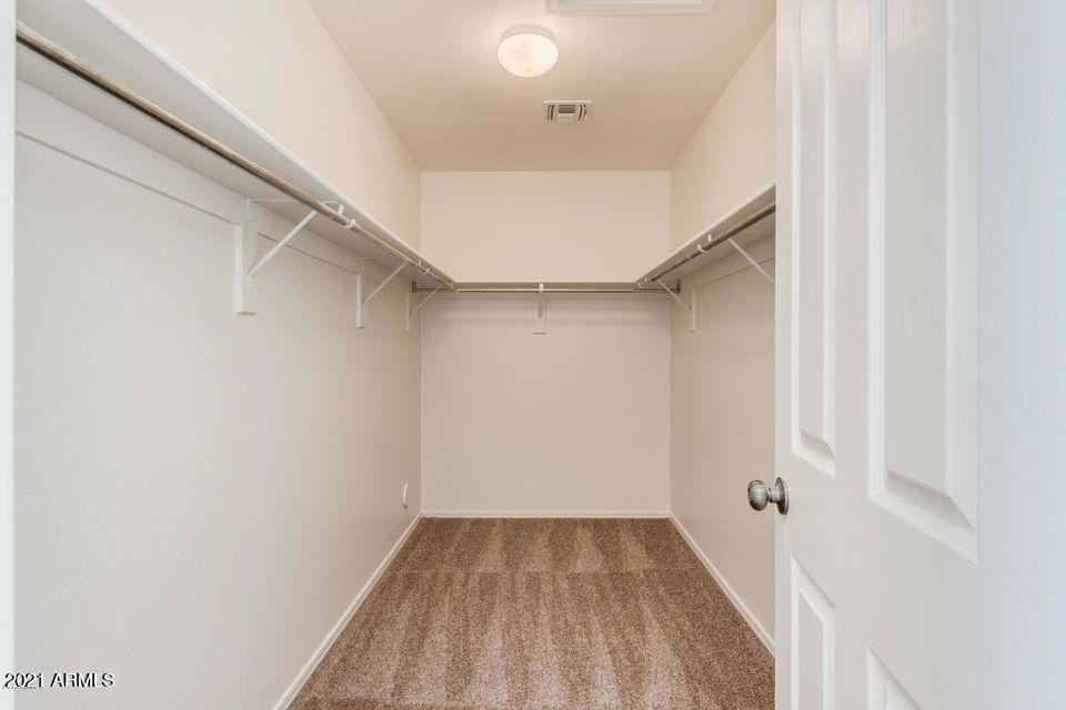 9369 West Eaton Road Phoenix, AZ 85037 - Photo 18 of 24 Walking closet master bedroom