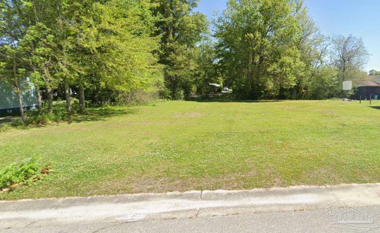 a view of a yard with an outdoor space