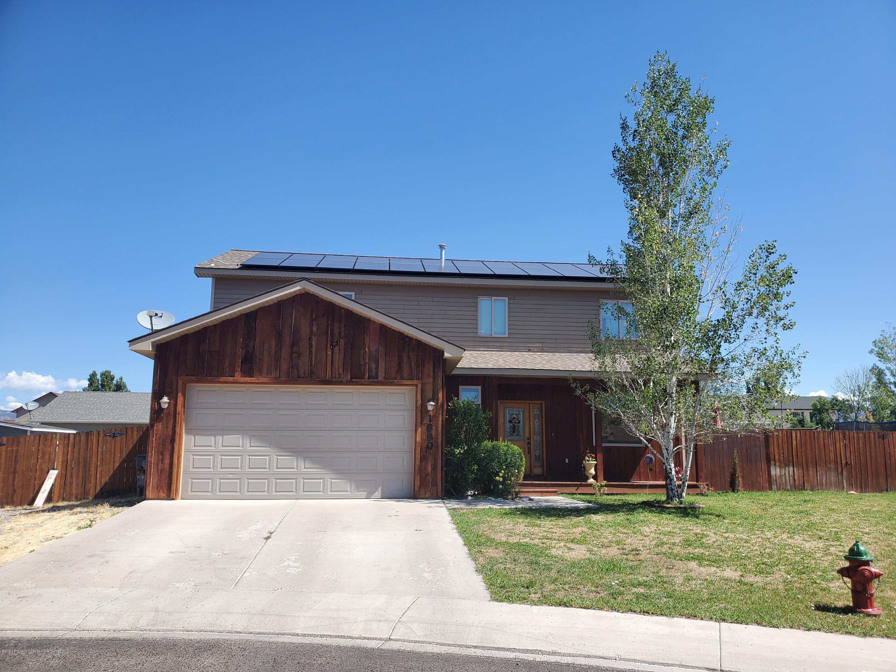 1880 Anvil Court Rifle, CO 81650 - Photo 1 of 16 a front view of a house with a yard