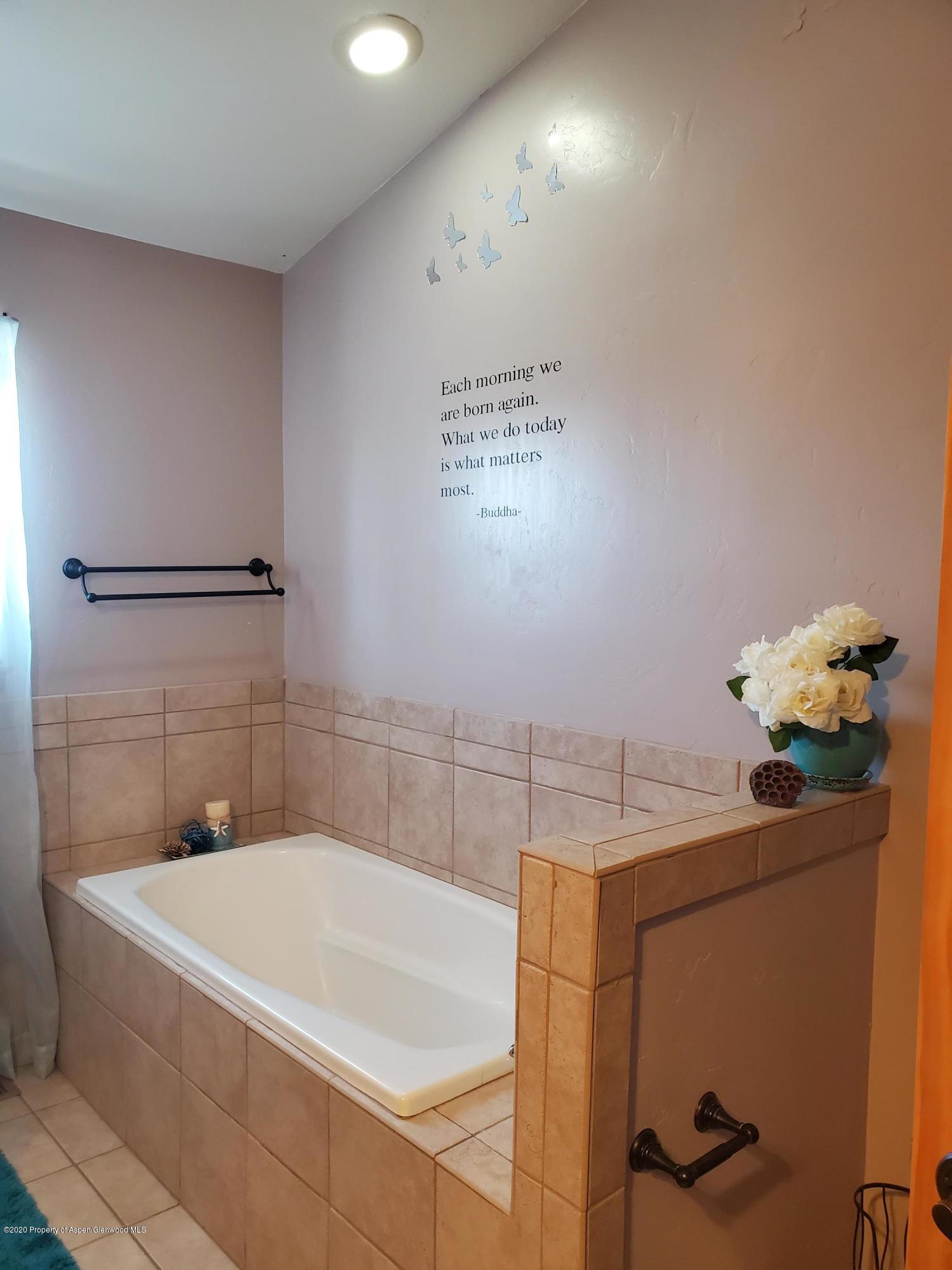 1880 Anvil Court Rifle, CO 81650 - Photo 14 of 16 a bathroom with a bathtub