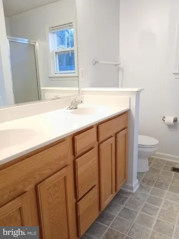 a view of a room with a hallway