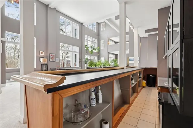 a kitchen with stainless steel appliances granite countertop a stove and a sink