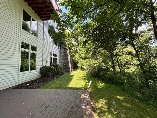 a view of backyard with green space