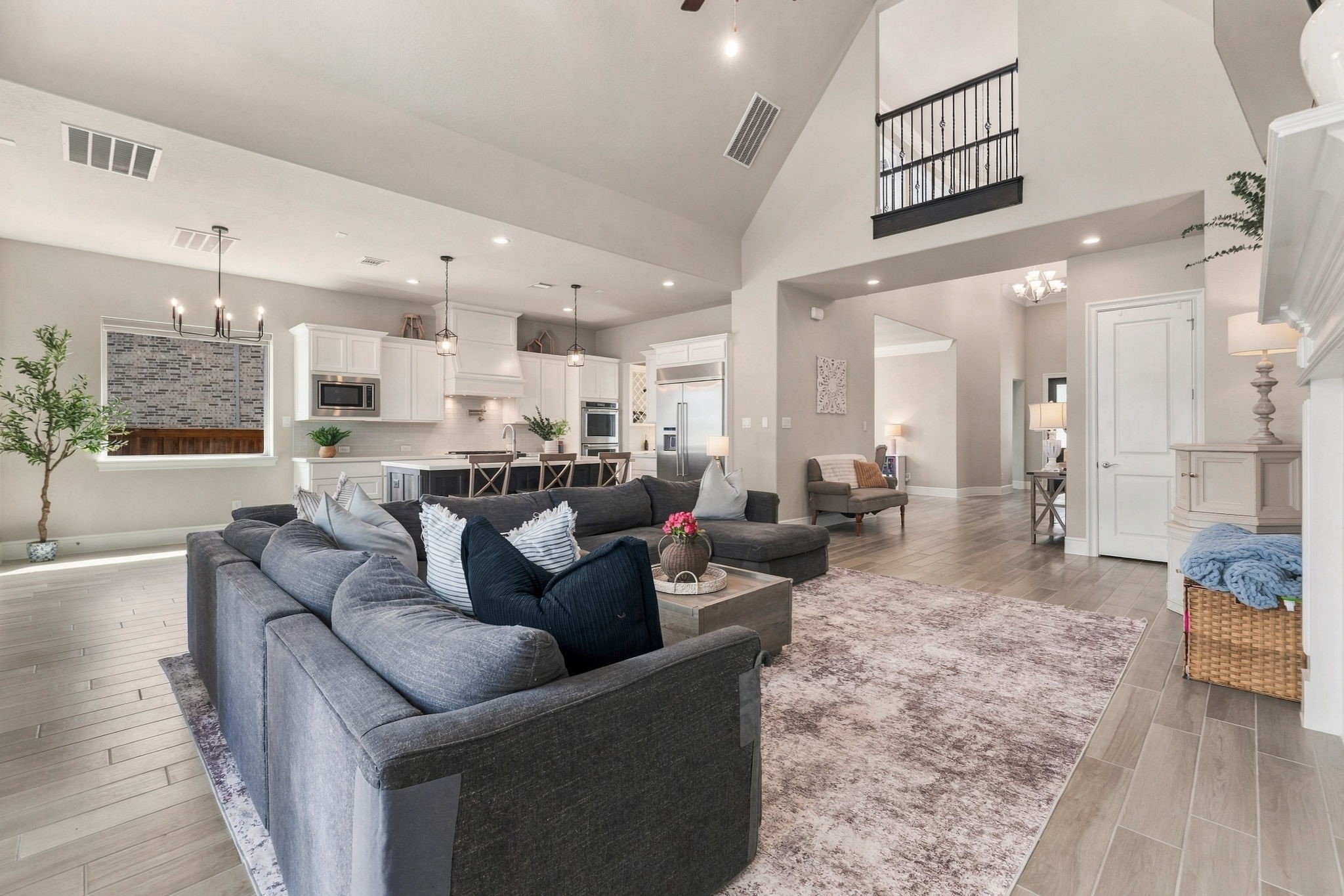 26910 Selinsgrove Road Magnolia, TX 77354 - Photo 15 of 47 The open upper level adds volume and architectural interest to the room.