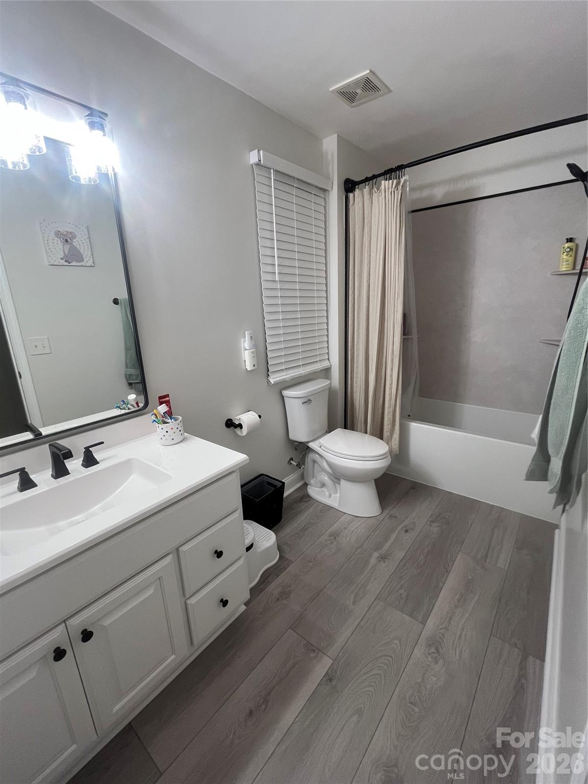 226 Waterlemon Way Monroe, NC 28110 - Photo 24 of 29 a spacious bathroom with double vanity and a mirror