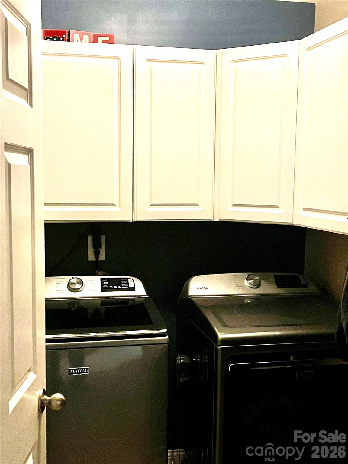 226 Waterlemon Way Monroe, NC 28110 - Photo 28 of 29 a kitchen with a sink a stove and two night stand