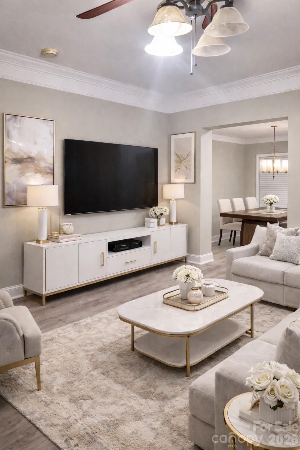 226 Waterlemon Way Monroe, NC 28110 - Photo 3 of 29 a living room with furniture and a flat screen tv