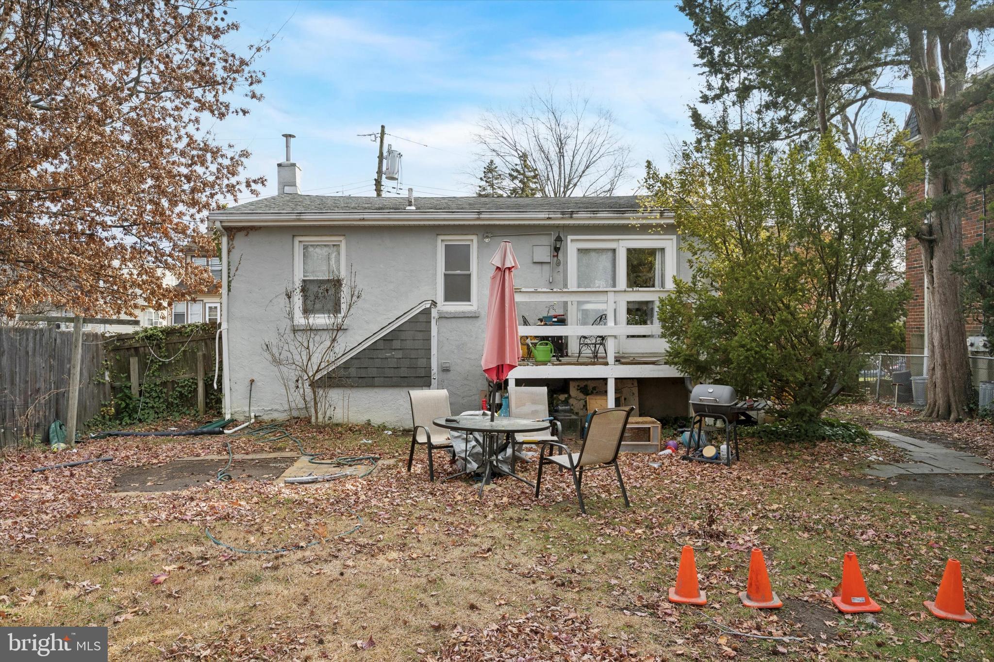 909 Walnut Street Collingdale, PA 19023 - Photo 14 of 15 a backyard of a house with table and chairs