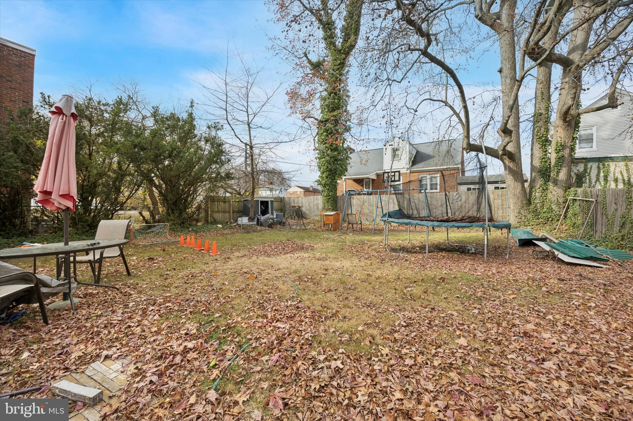 909 Walnut Street Collingdale, PA 19023 - Photo 15 of 15 a backyard of a house with lots of green space