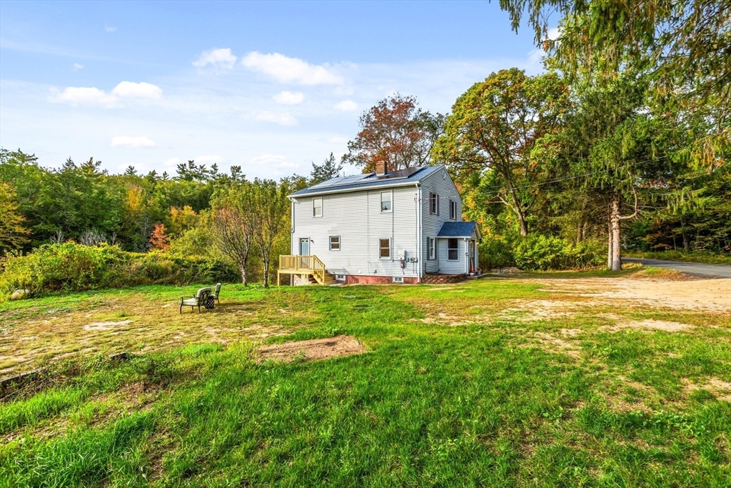 16 Neale Road Royalston, MA 01368 - Photo 32 of 38 a view of a backyard with a garden and entertaining space