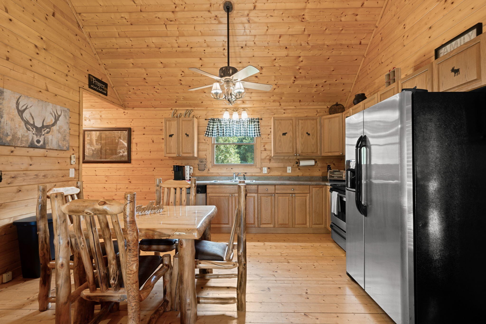 947 Belltown Road Copperhill, TN 37317 - Photo 7 of 26 a kitchen with cabinets and refrigerator