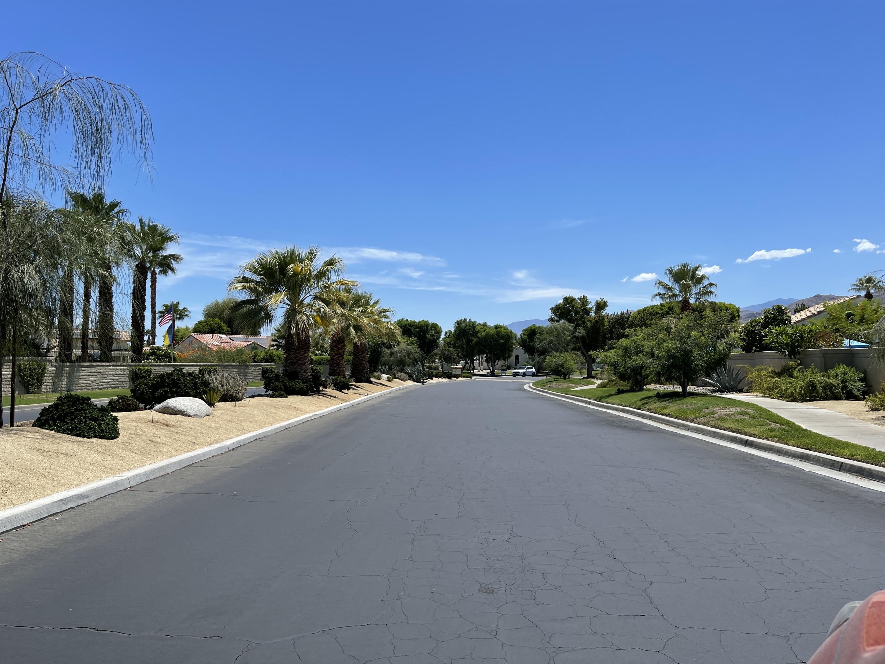 69573 Corta Celeste Cathedral City, CA 92234 - Photo 18 of 23 a view of a street with a houses