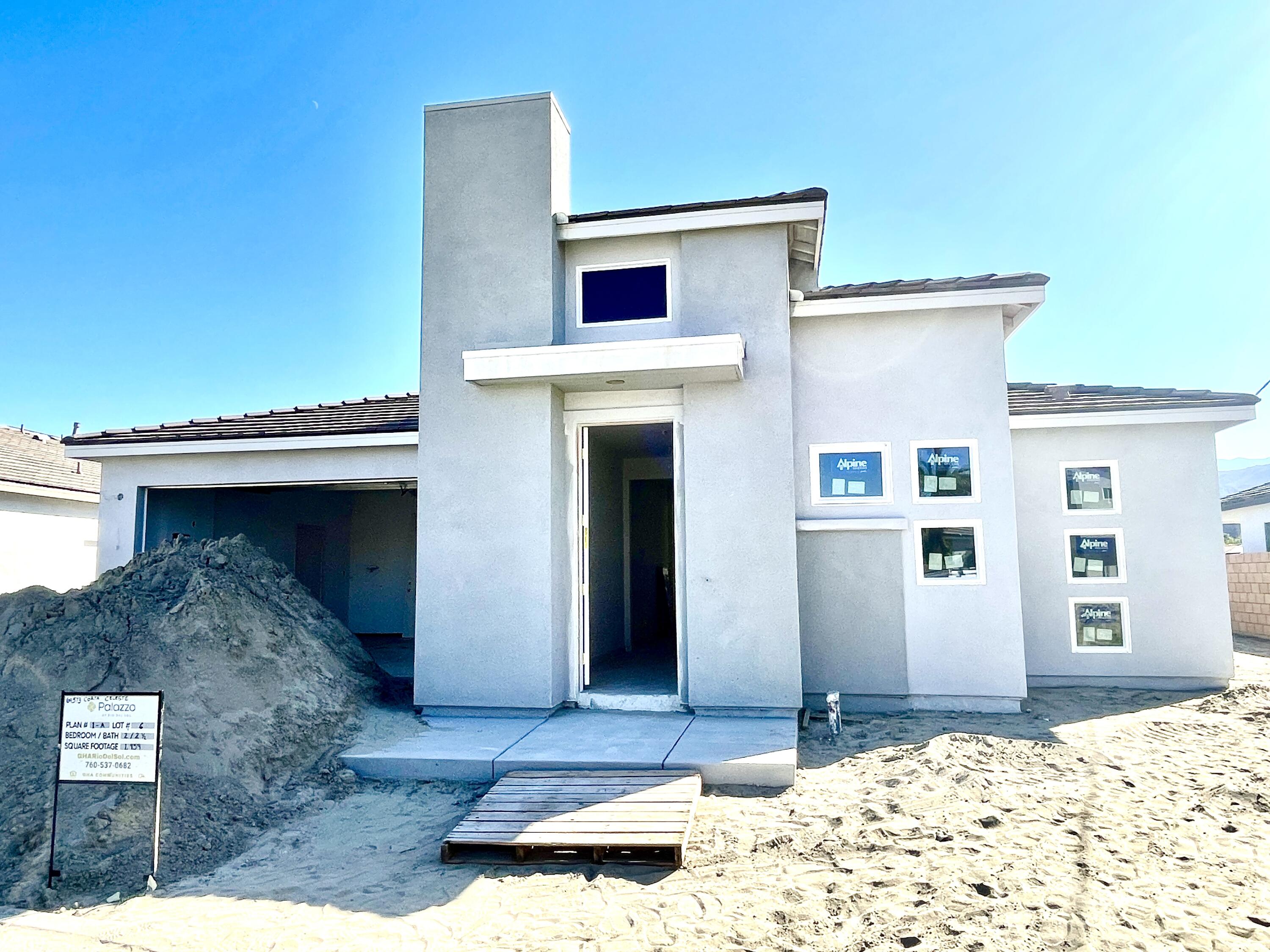 69573 Corta Celeste Cathedral City, CA 92234 - Photo 2 of 23 a front view of a house