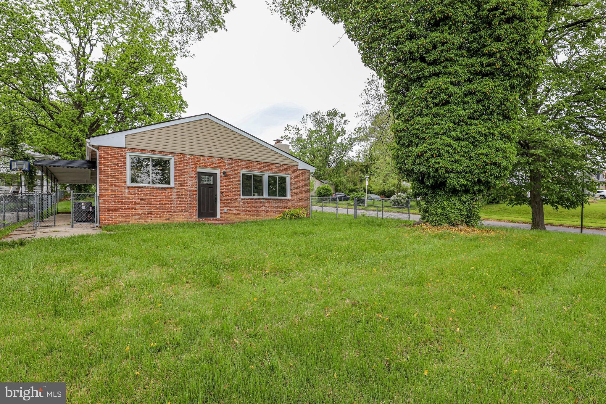 4100 Alto Road Baltimore, MD 21216 - Photo 3 of 33 a front view of house with yard and green space