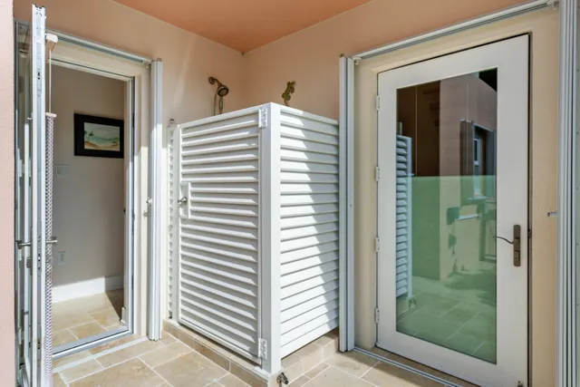 a work room with furniture and a window