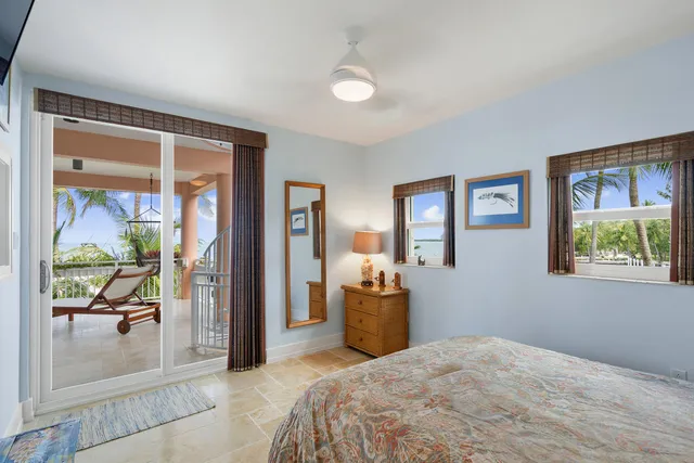 a living room with furniture and a gate
